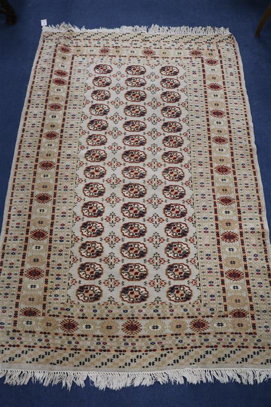 A Bokhara cream ground rug 190x 125cm